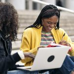 Cool Afro Girls Using Laptop