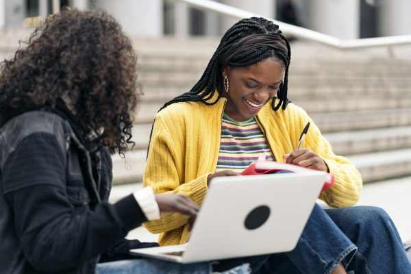 Cool Afro Girls Using Laptop